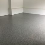 Lakeville custom garage floor installed by Millz House featuring epoxy garage floor coating in Marble All Chip