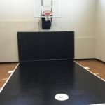 2017 Fall Parade of Homes_Michael Paul Design_Indoor Game Court Featuring SnapSports Revolution Toughshield Dark Maple with Black athletic flooring