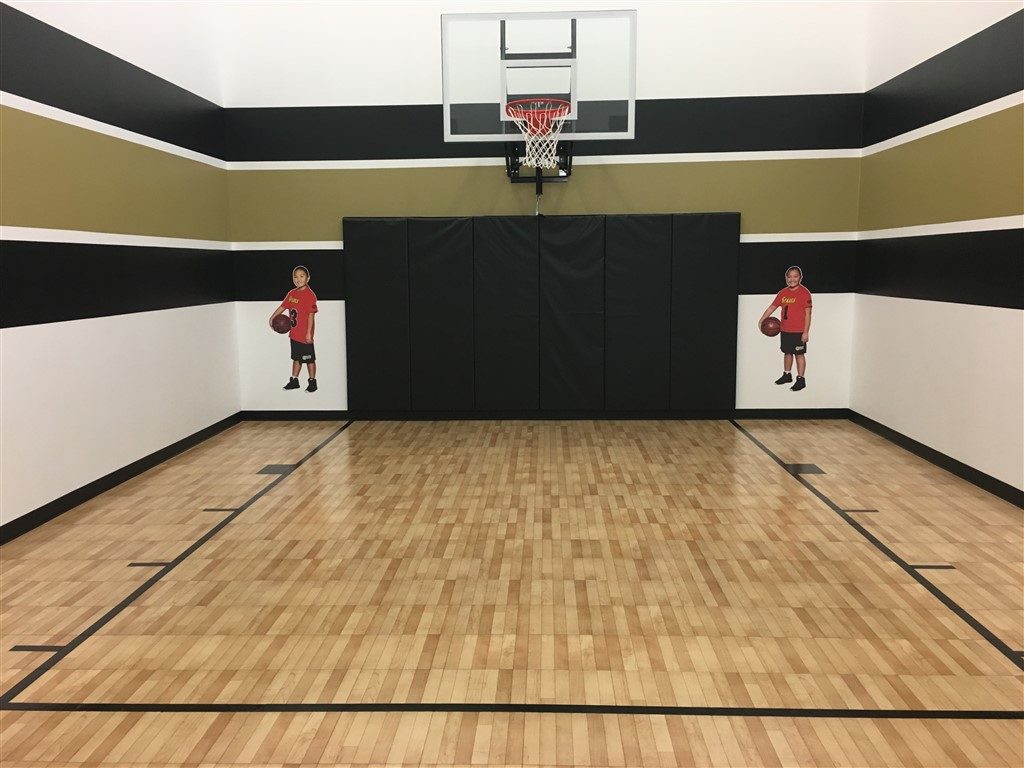 Millz House installed indoor basketball court using SnapSports athletic tiles