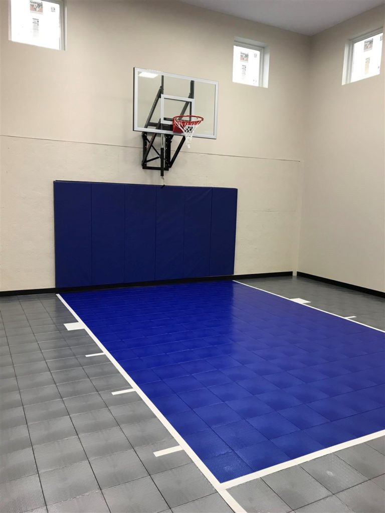 Millz House installed this indoor game court utilizing SnapSports athletic flooring tiles