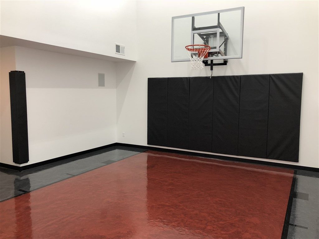 Twin Cities Spring Parade of Homes #197 indoor basketball court featuring epoxy floor coating installed by Millz House