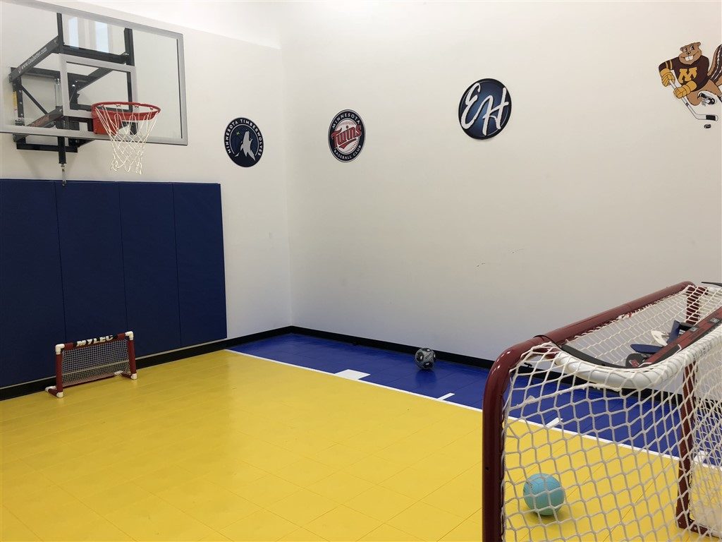 Twin Cities Spring Parade of Homes featuring Indoor Basketball Court installed by Millz House using SnapSports Bounceback athletic floor tiles